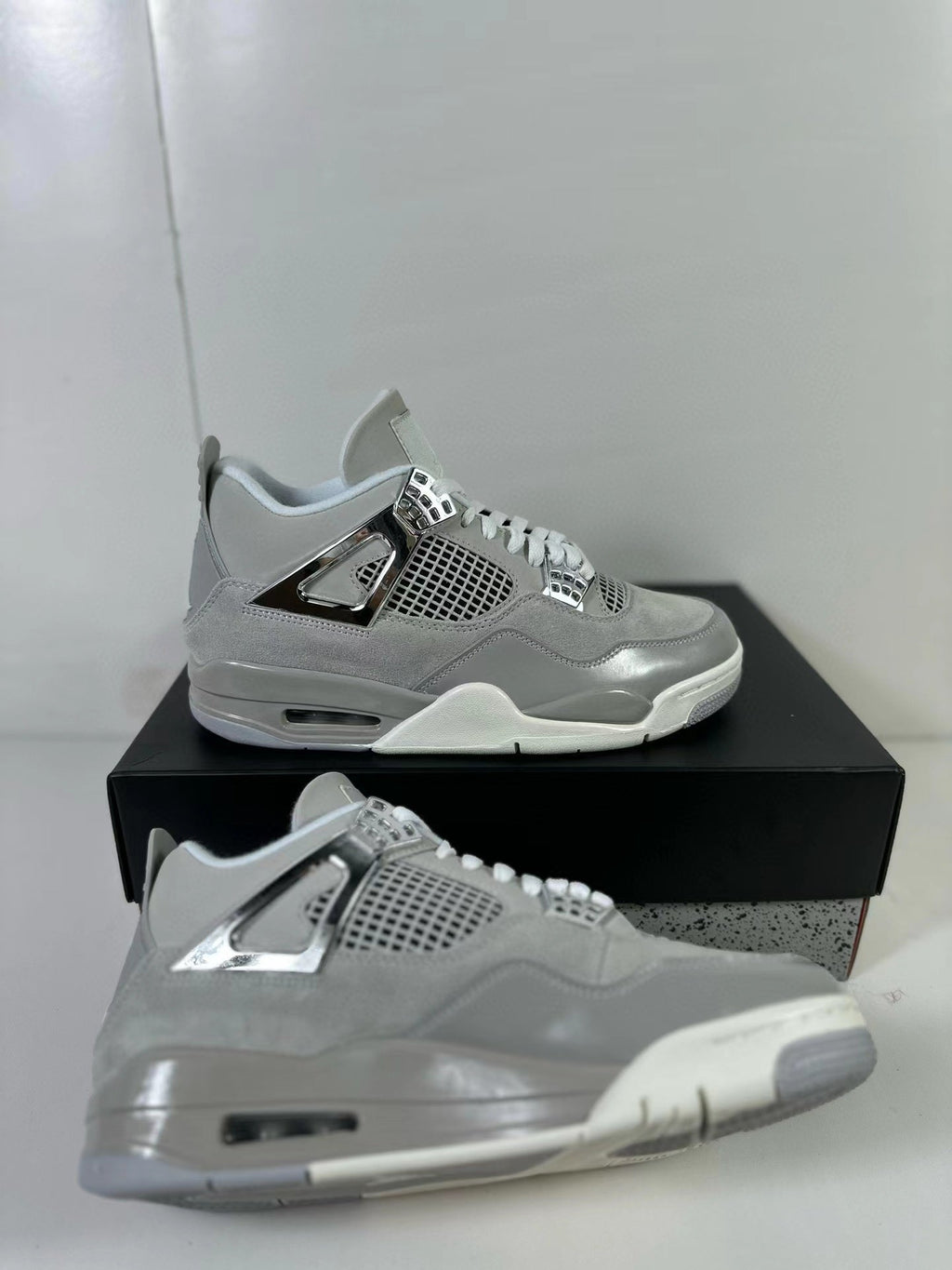 Air Jordan 4 Light Iron Ore Frozen Moments Sneakers - product image from the listing.