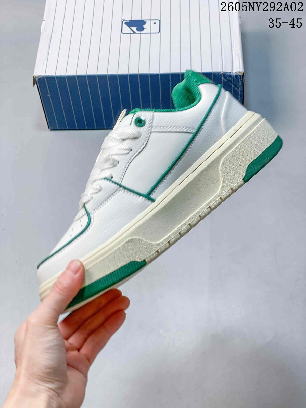 MLB Chunky Liner Low-Top Sneakers in White and Green - product image from the listing.
