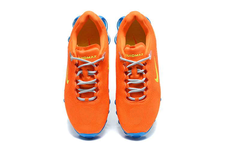 Nike Air Max Plus Sneakers in Orange and Blue - product image from the listing.