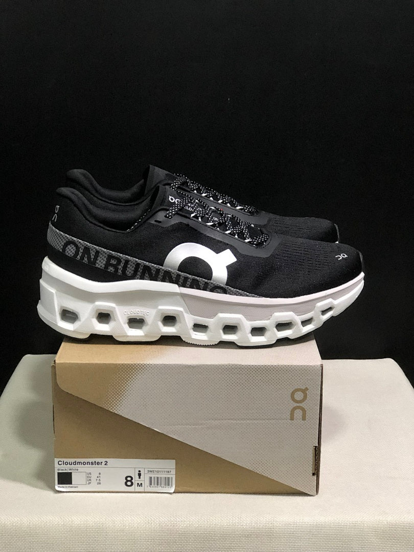 On Cloudmonster 2 Running Shoes in Black White - product image from the listing.