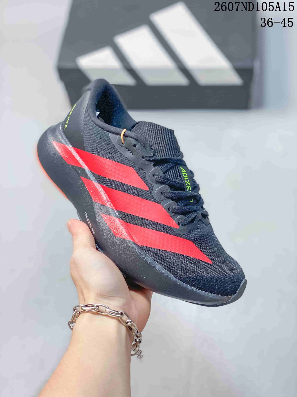 Adidas Adizero Evo SL Low-Cut Sneakers - product image from the listing.