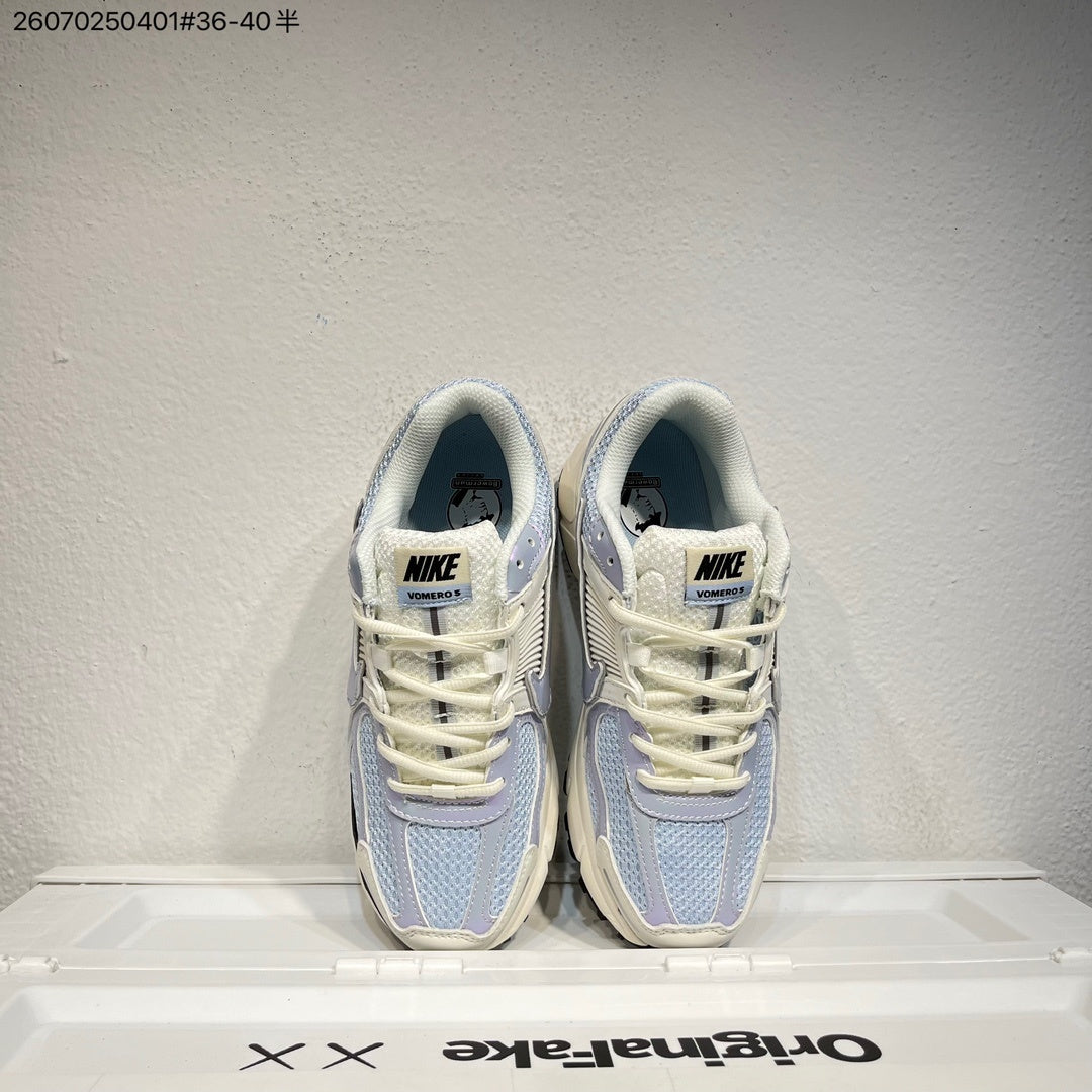 Nike Air Zoom Vomero 5 Trainers in Cream, Blue and Lavender - product image from the listing.