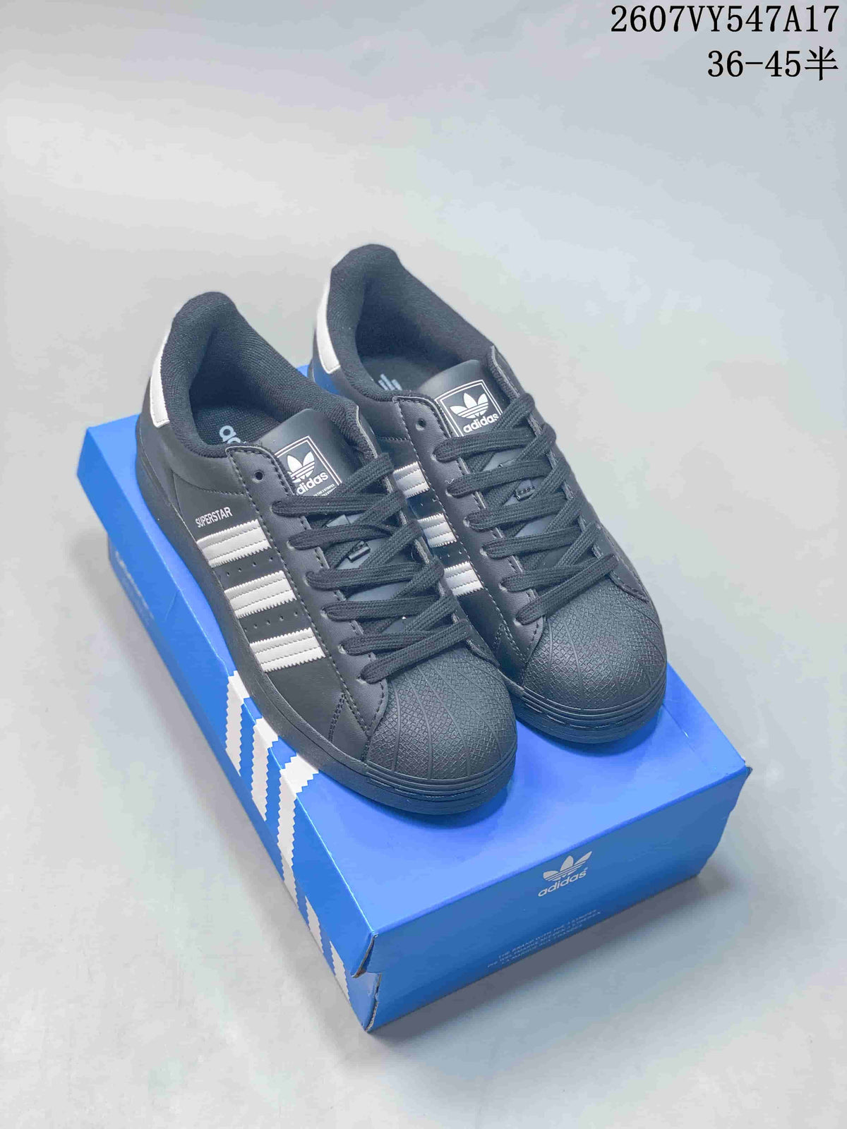 Adidas Originals Superstar Sneakers in Black and White - product image from the listing.