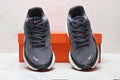 Nike Revolution 8 Running Shoes, in Charcoal and Pink - product image from the listing.