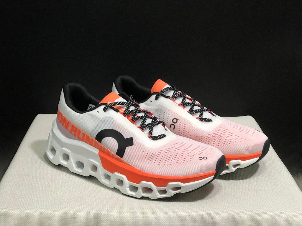 White and Orange On Cloudmonster 2 Running Shoes - product image from the listing.