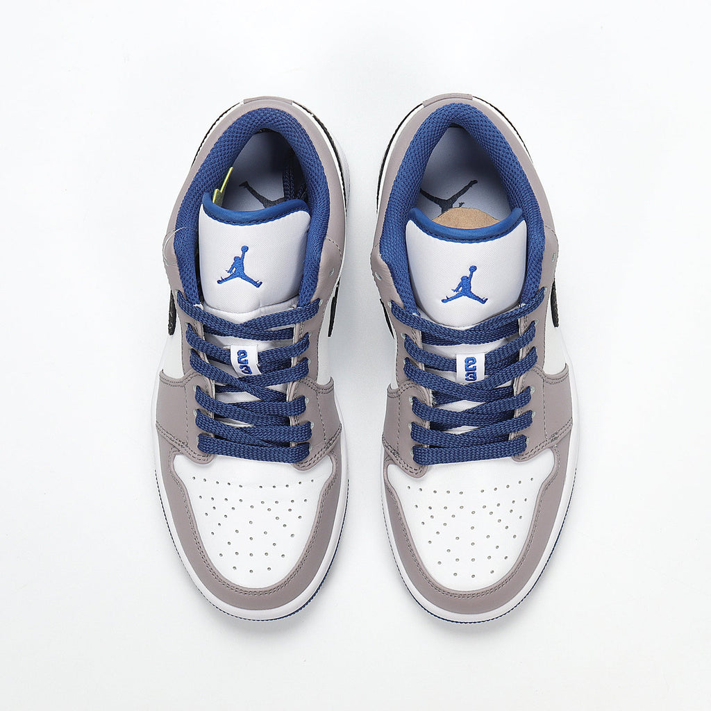 Jordan 1 Low Sneakers in White Grey Blue 553558-103 - product image from the listing.