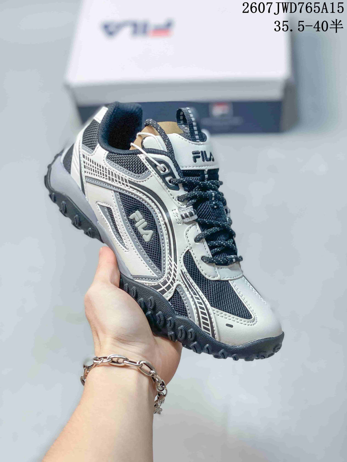 Women's FILA Pebble Low-Top Sneakers Black and White - product image from the listing.