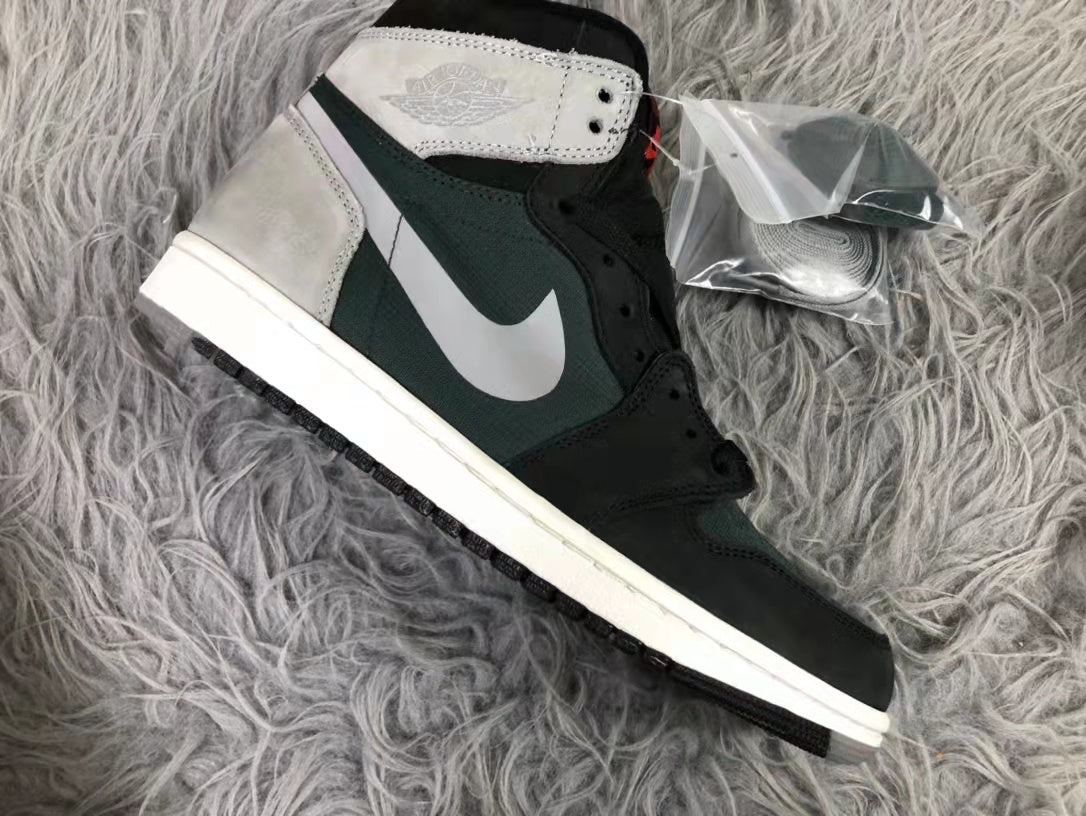 Air Jordan 1 Element Gore-Tex High-Top Sneakers in Black Grey - product image from the listing.