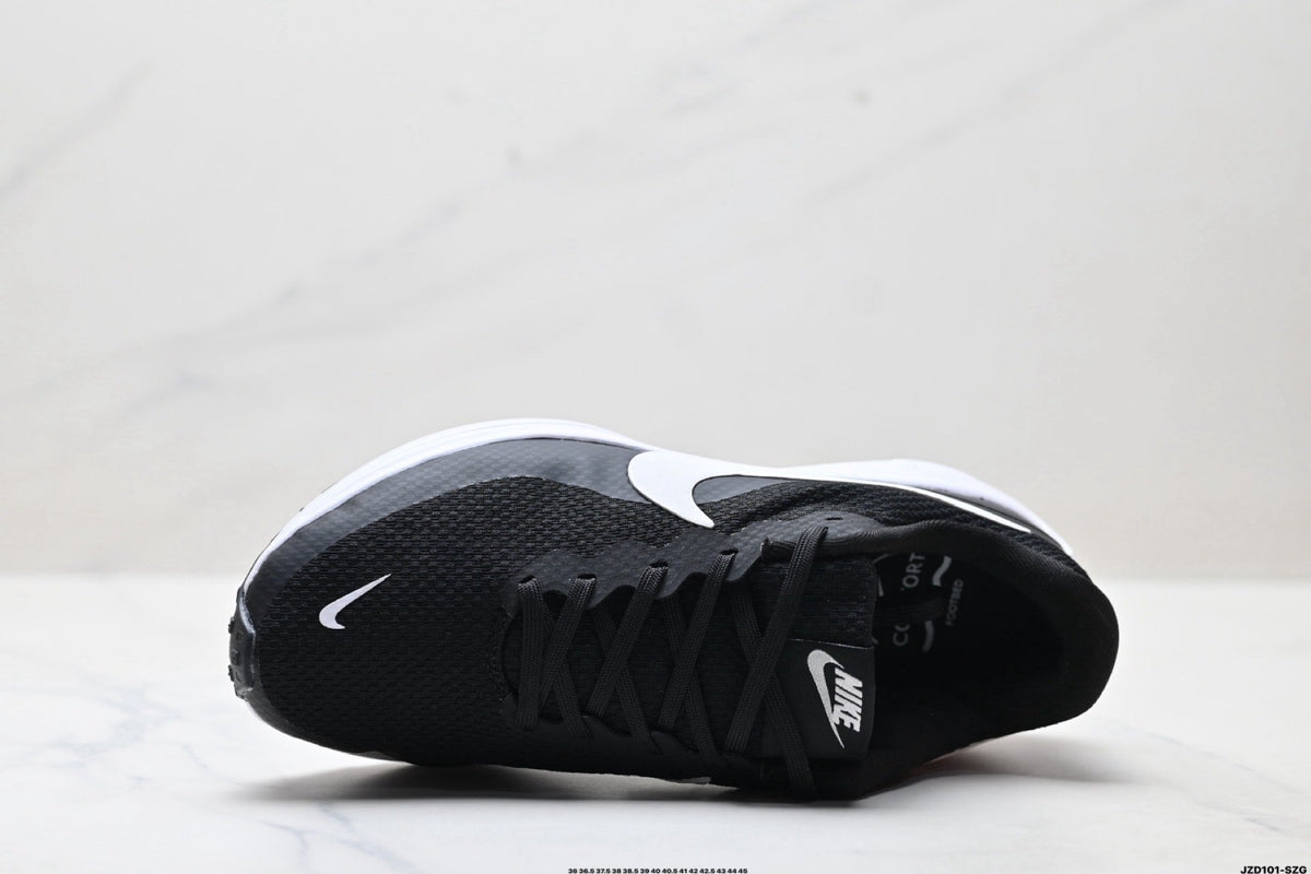 Nike Revolution 8 Running Sneakers in Black and White - product image from the listing.