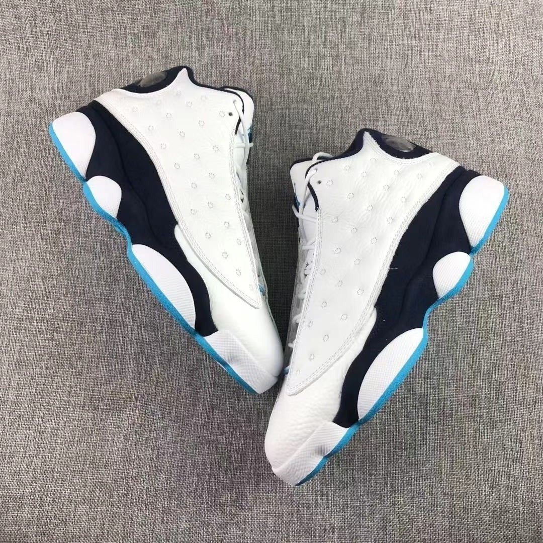 Air Jordan 13 Dark Powder Blue Sneakers White Navy - product image from the listing.