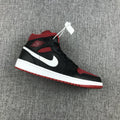 Black Red Canvas-Style Sneakers - Jordan 1 Mid 554724-020 - product image from the listing.