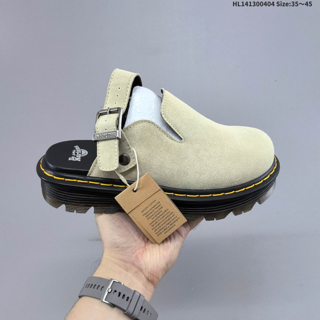 Buckle-Strap Mule Clogs in Black and Sage by Dr. Martens - product image from the listing.