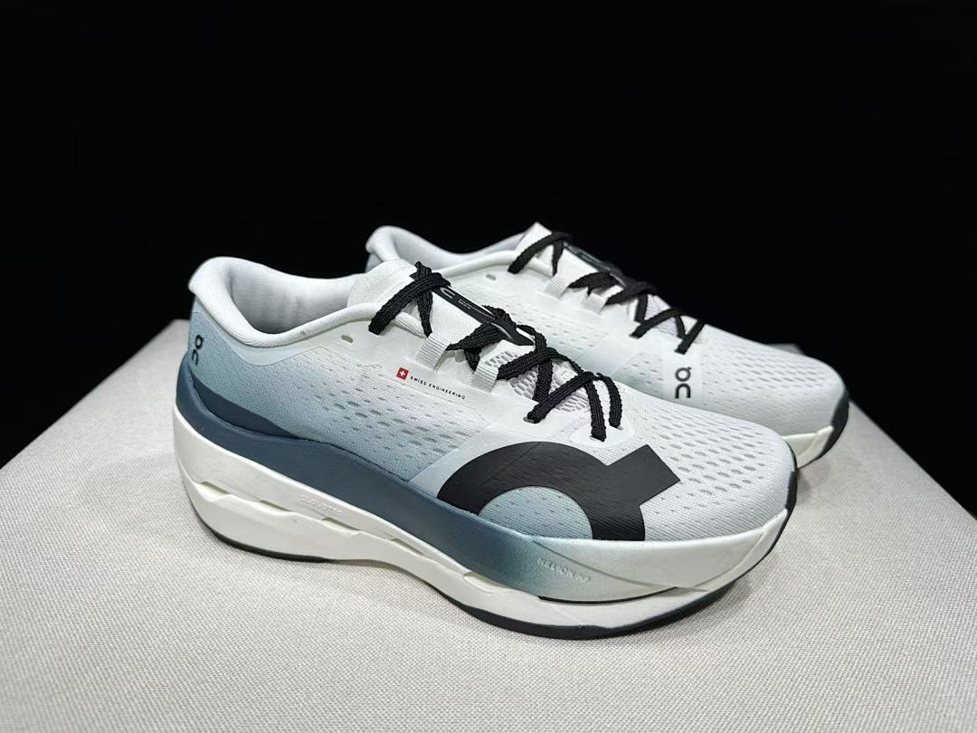 On Cloudboom Max Running Shoes in White and Lake in Blue - product image from the listing.