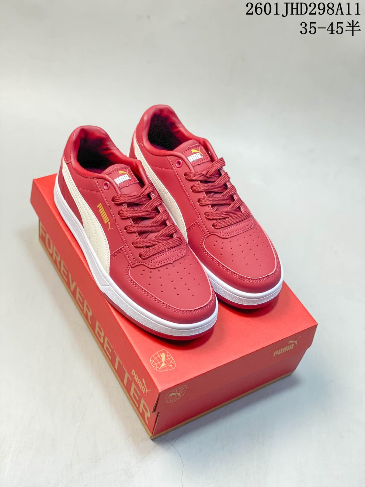 Puma Caven 2.0 Low-Top Sneakers in Red and White/Navy - product image from the listing.