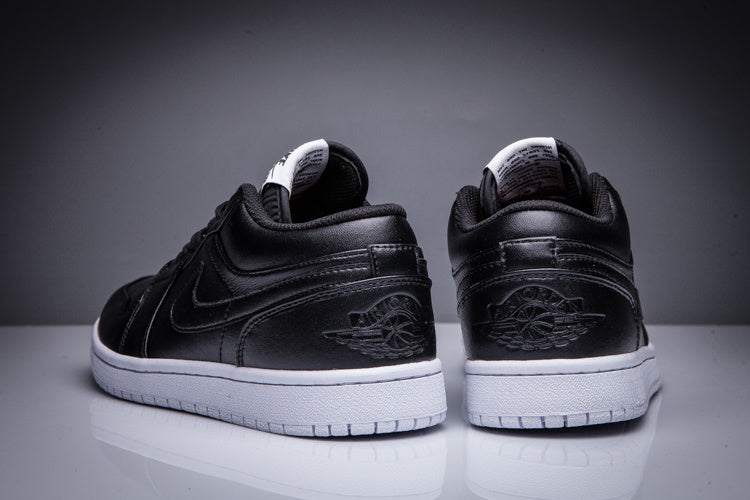 Air Jordan 1 Low Black and White Sneakers - product image from the listing.