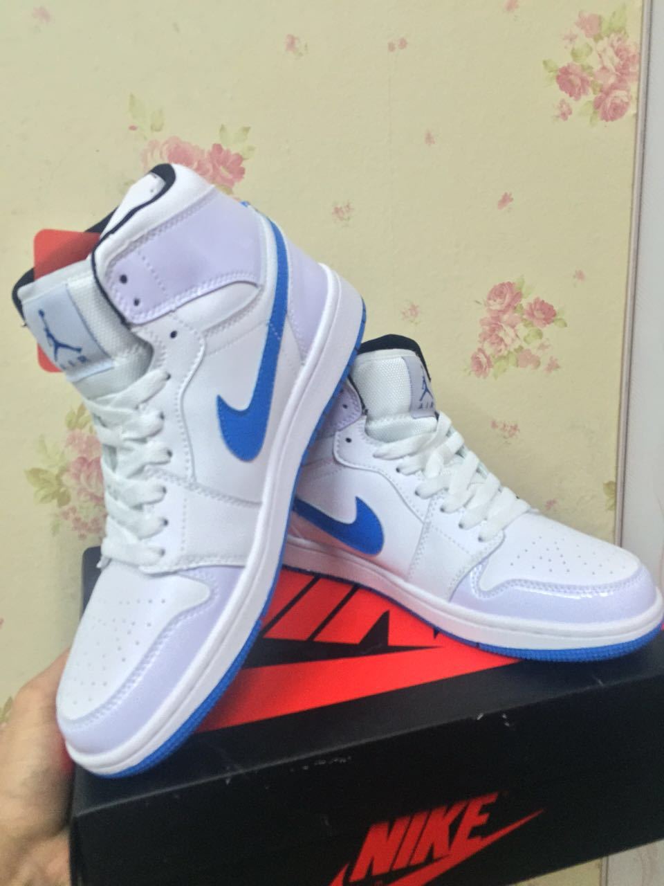 Air Jordan 1 High White and Royal Blue Sneakers - product image from the listing.
