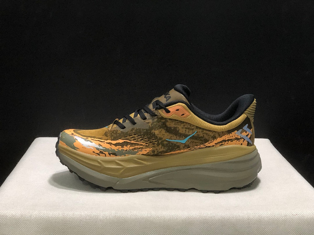 HOKA Stinson 7 Trail Shoes for Running in Camo - product image from the listing.