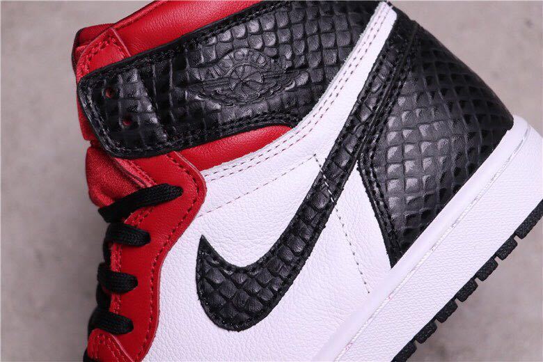 Women's Air Jordan 1 Satin Snake High-Top Sneakers CD0461-601 - product image from the listing.