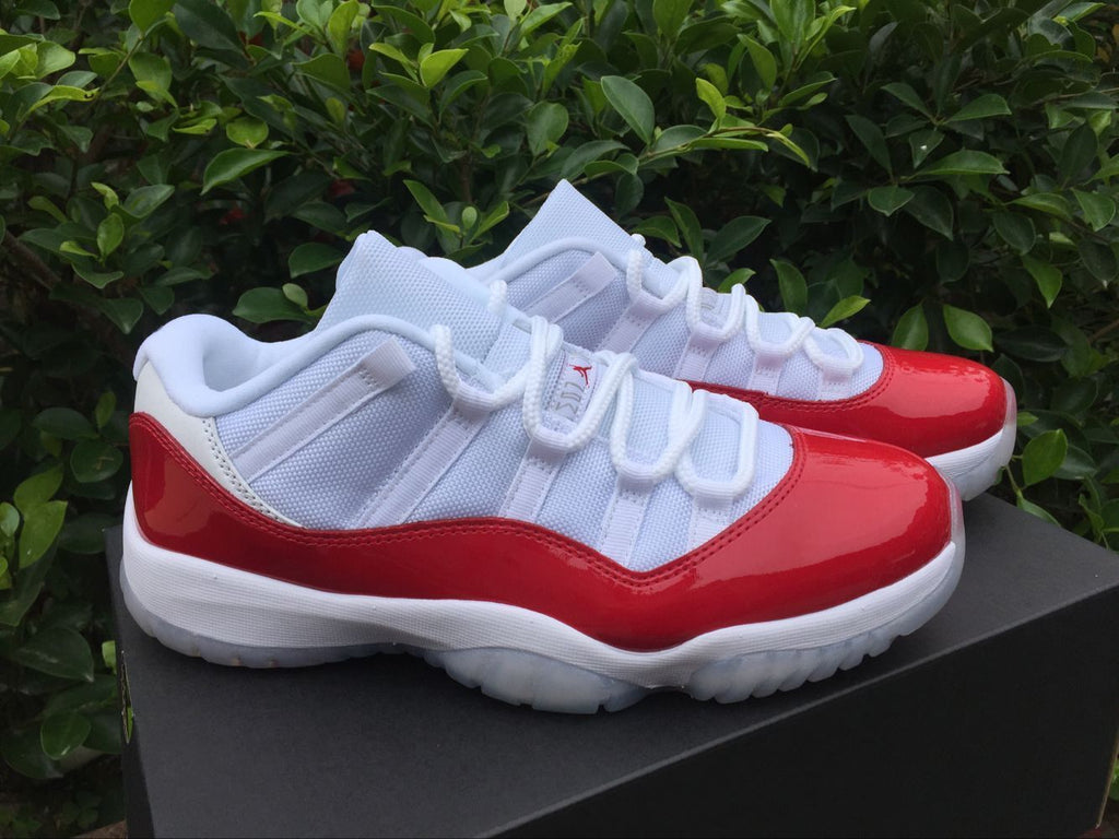 Air Jordan 11 Low Sneakers White Red - product image from the listing.