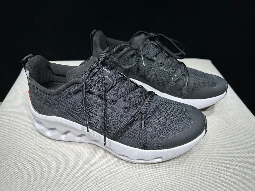 On Cloudsurfer Trail Trail Running Shoes in Black and White - product image from the listing.