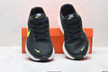 Nike Revolution 8 Running Shoes, in Black and Volt - product image from the listing.