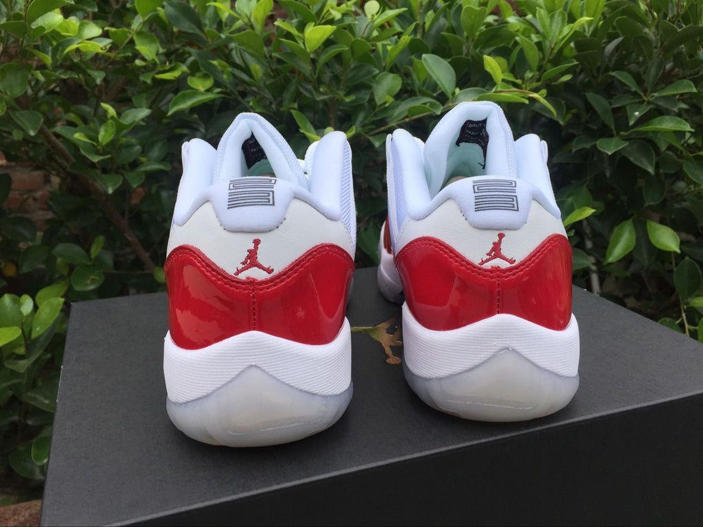 Air Jordan 11 Low Sneakers White Red - product image from the listing.