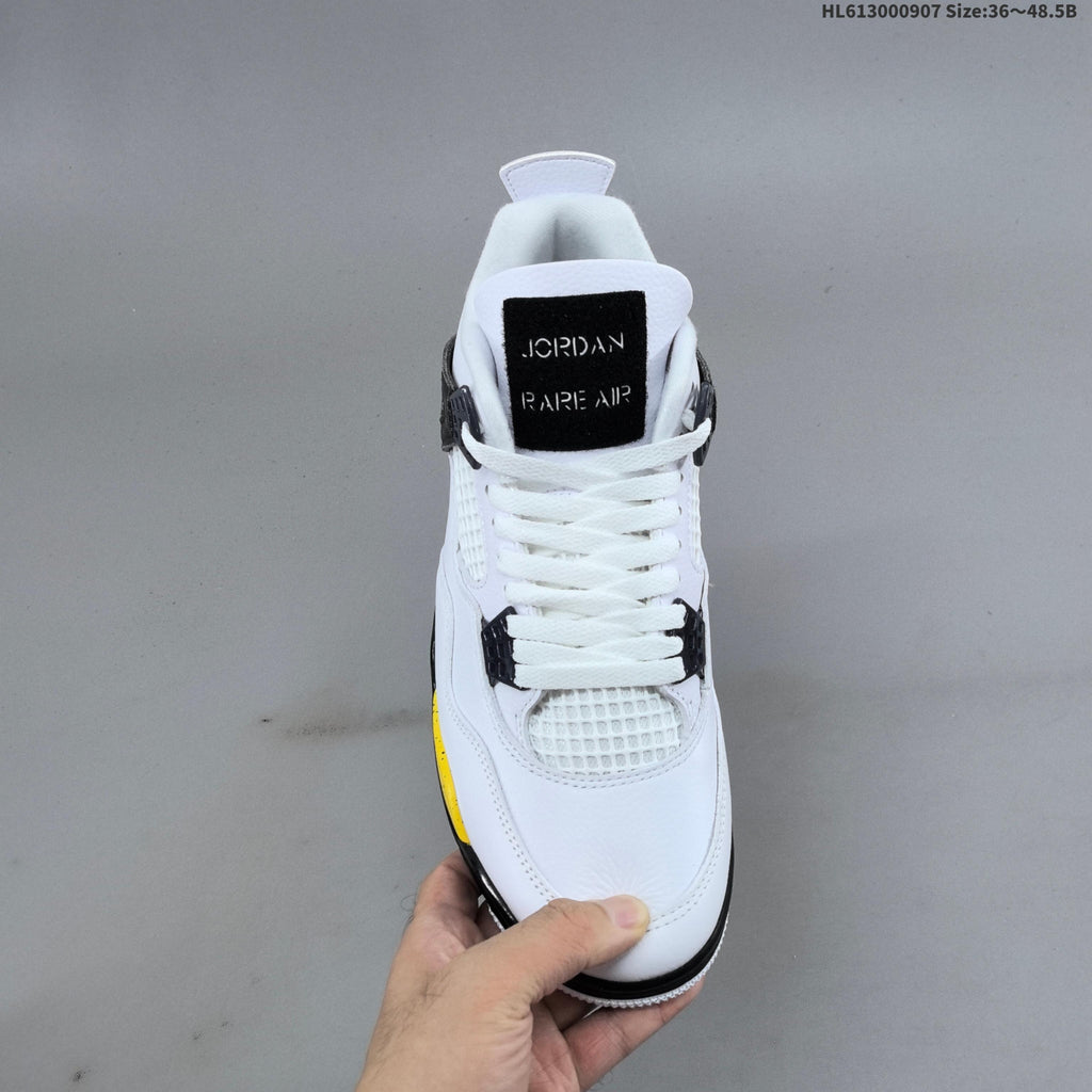 Air Jordan 4 Retro White Yellow Black Sneakers - product image from the listing.