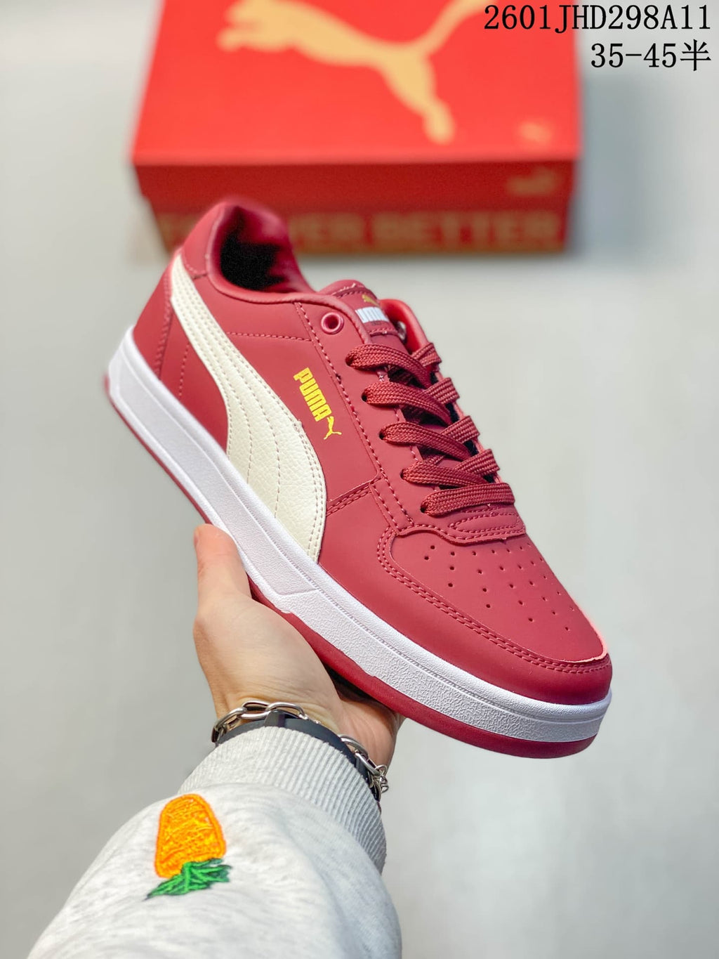 Puma Caven 2.0 Low-Top Sneakers in Red and White/Navy - product image from the listing.