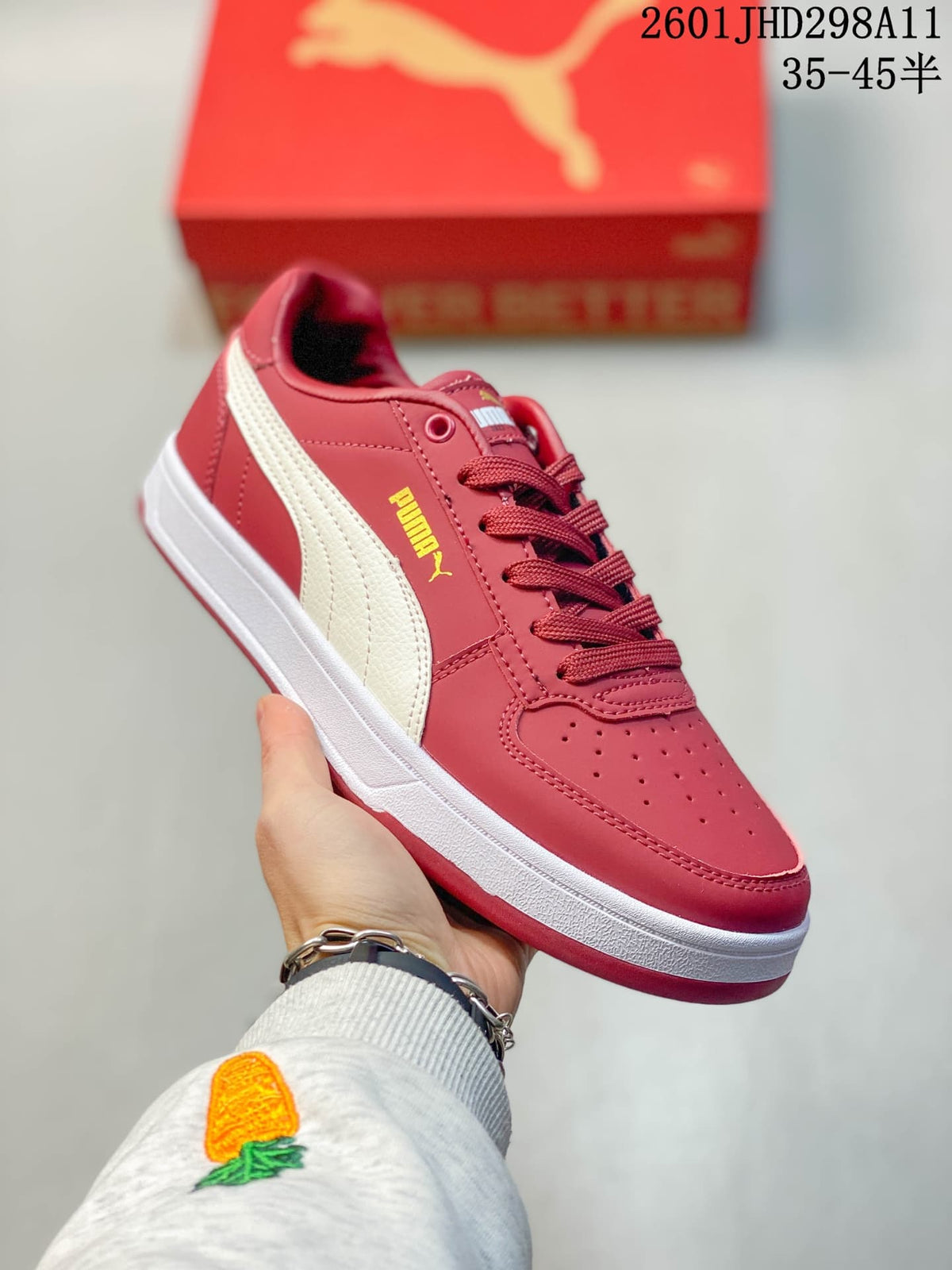 Puma Caven 2.0 Low-Top Sneakers in Red and White/Navy - product image from the listing.