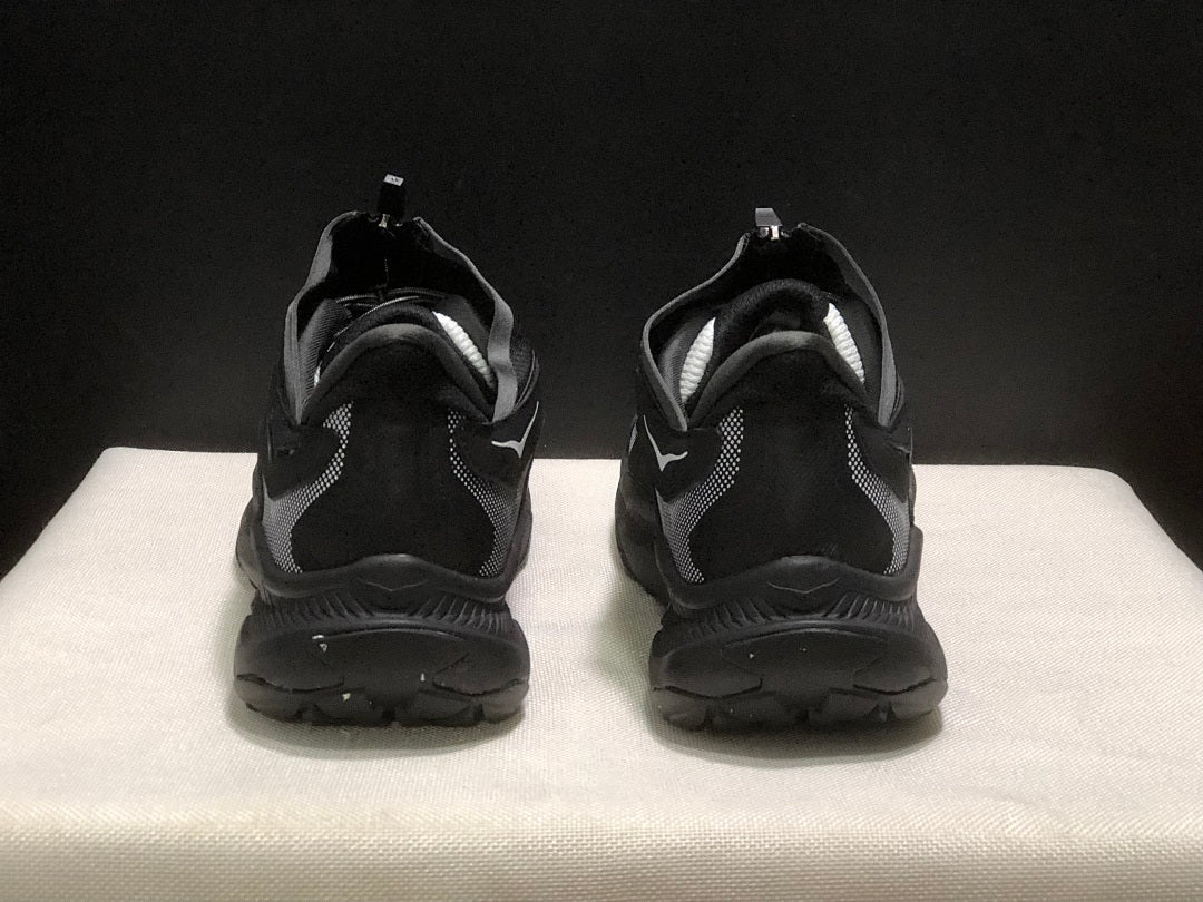 Black HOKA Project Transport Zip Sneakers - product image from the listing.