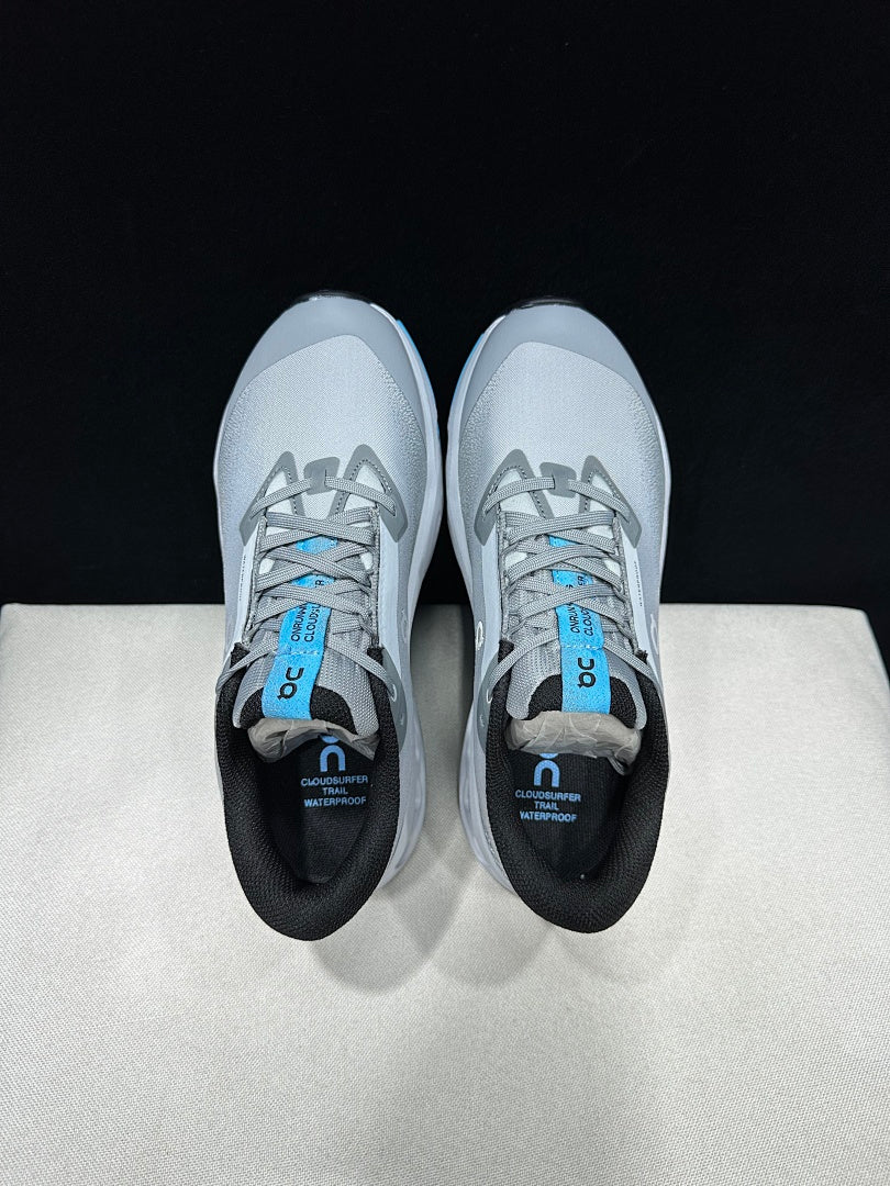 On Cloudsurfer Trail 2 Waterproof Trail Running Shoes in Gray Blue - product image from the listing.