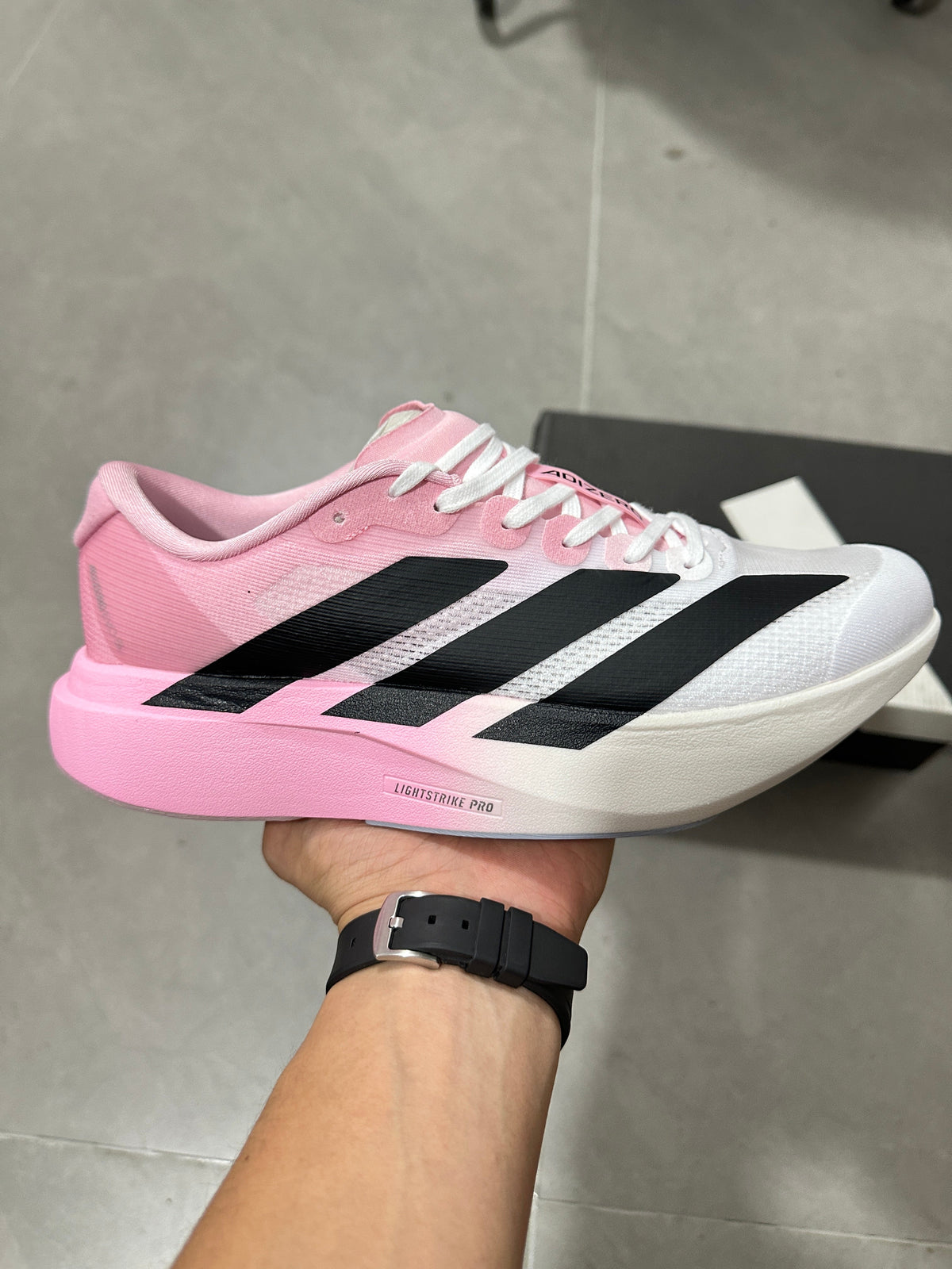 adidas Lightstrike Pro Running Shoes in Pink White JH6206 - product image from the listing.