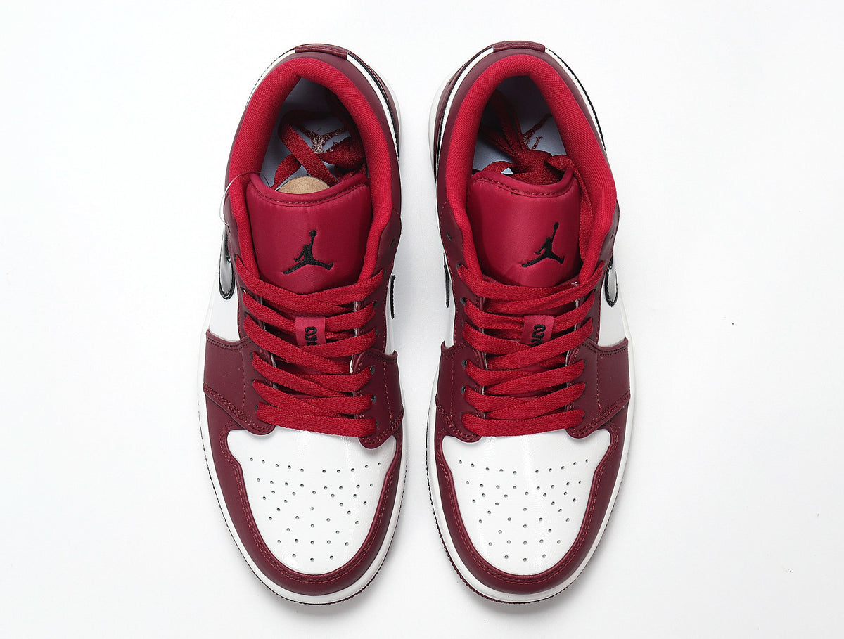 Jordan 1 Low White and Rose Sneakers in Red 553558-604 - product image from the listing.