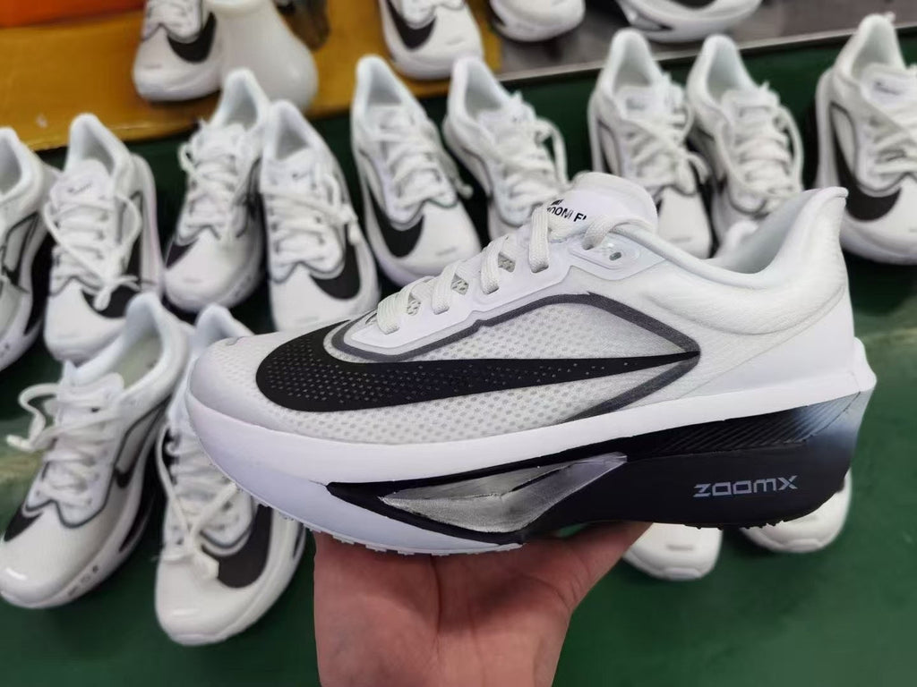 Nike Zoom Fly 6 Running Shoes in White Grey Black FN8454-100 - product image from the listing.