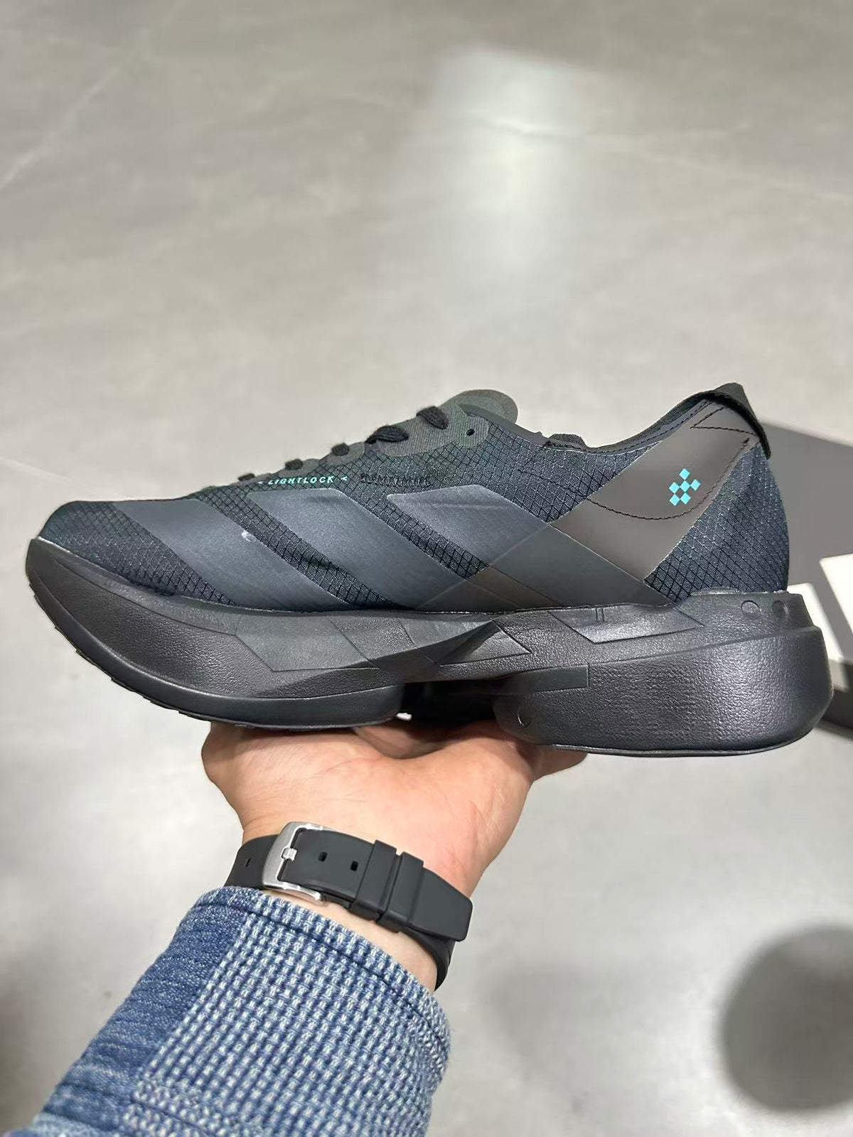 Nike Lightstrike Pro Running Shoes in Black Gray HQ7411 - product image from the listing.