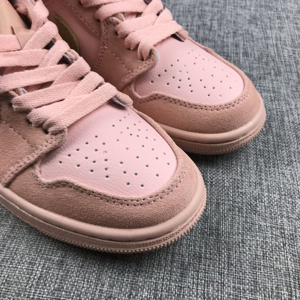 Jordan 1 Mid SE Sneakers in Pink 852542-600 - product image from the listing.