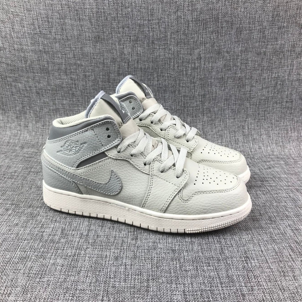 White and Grey Air Jordan 1 Mid Sneakers - product image from the listing.
