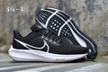 Nike Running Shoes, in Black and White - product image from the listing.