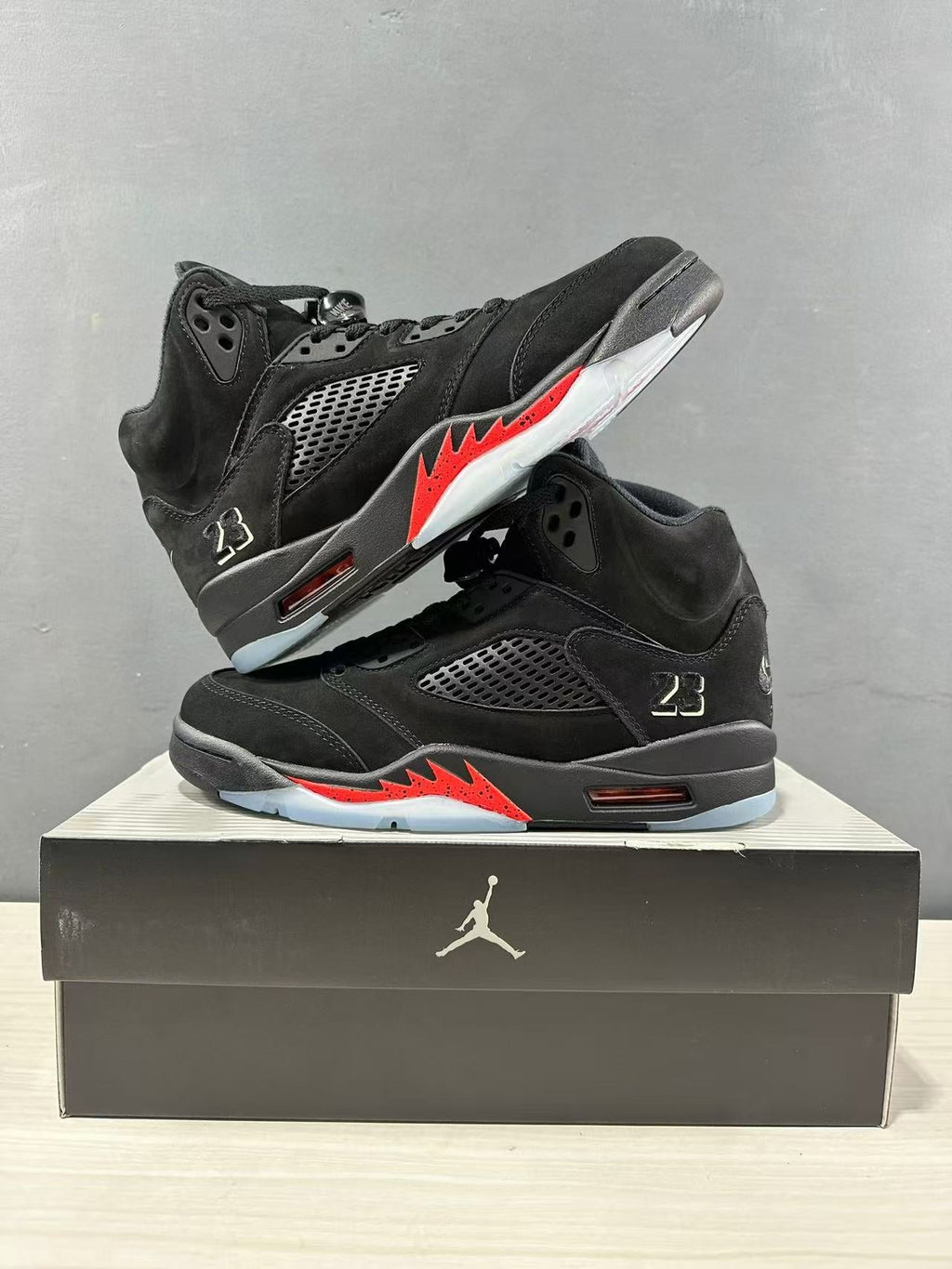 Air Jordan 5 Retro Sneakers Black and Red - product image from the listing.