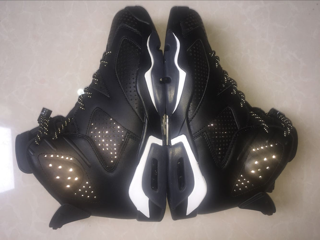 Jordan 6 Retro Black Cat High-Top Sneakers in Black and White - product image from the listing.