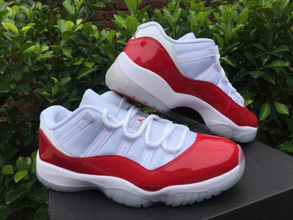 Air Jordan 11 Low Sneakers White Red - product image from the listing.