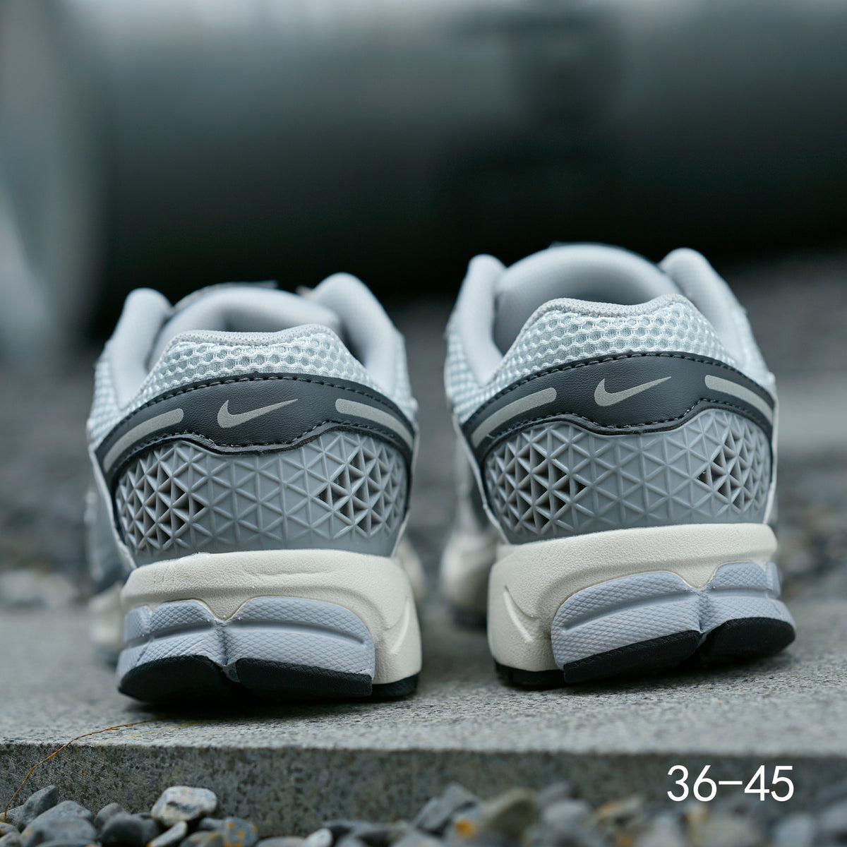 Light Gray and Navy Nike Air Zoom Vomero 5 Sneakers - product image from the listing.