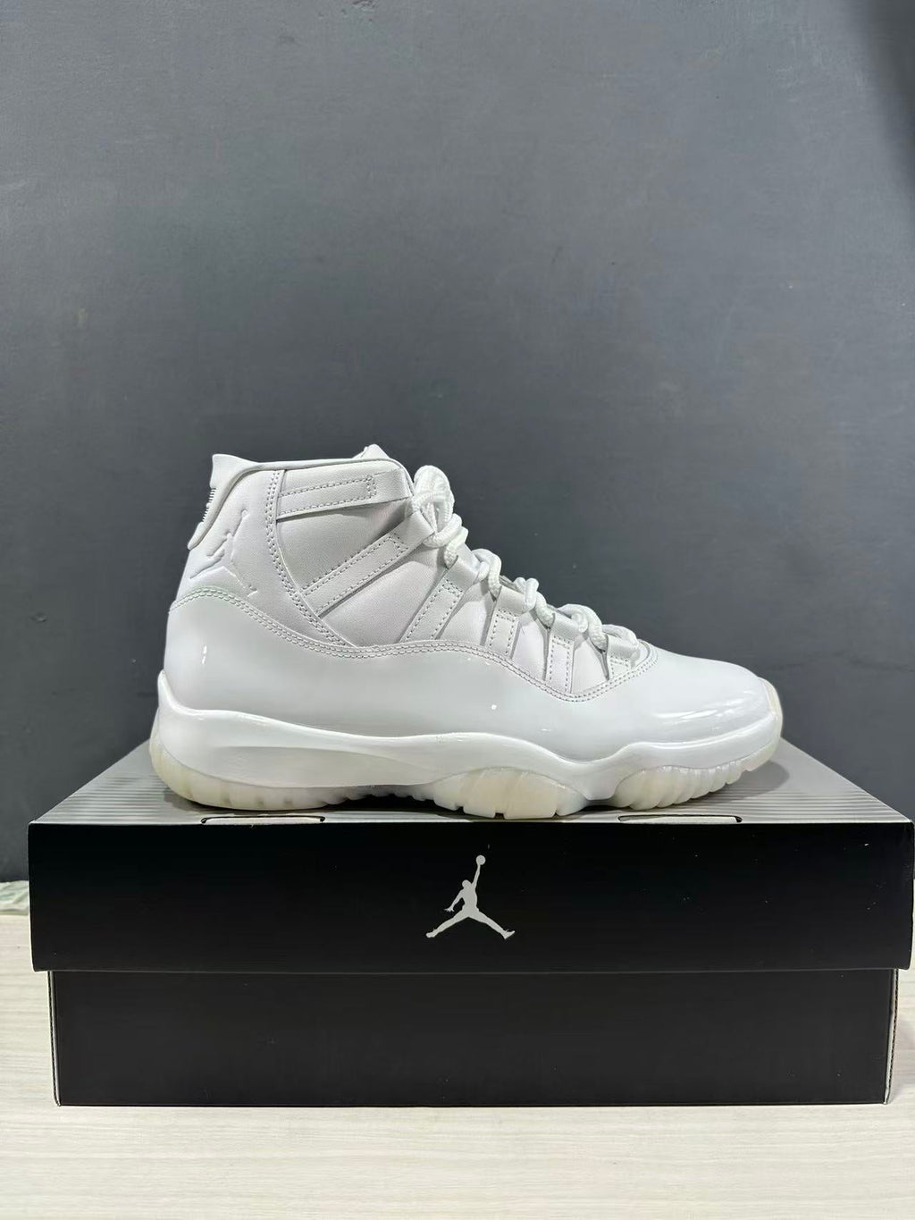 Air Jordan 11 Comme des Garçons White Sneakers IV7639-100 - product image from the listing.