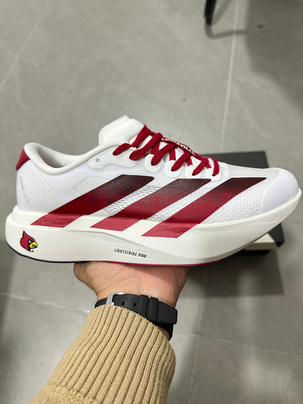 adidas Lightstrike Pro Running Shoes in White Burgundy - product image from the listing.