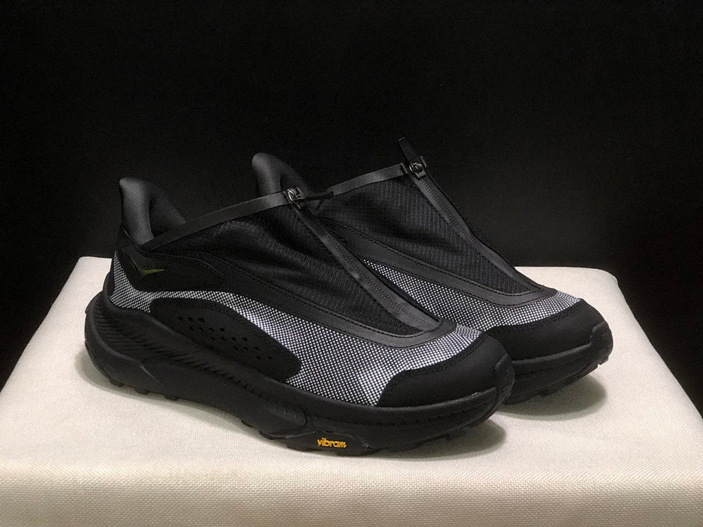 Black HOKA Project Transport Zip Sneakers - product image from the listing.