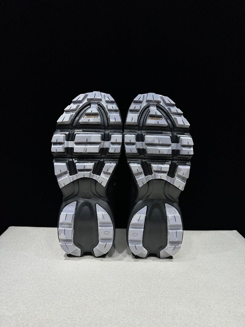 On x LOEWE Cloudsurfer Sneakers in Black - product image from the listing.
