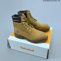 Yellow Mid-Top Lace-Up Boots by Timberland - product image from the listing.