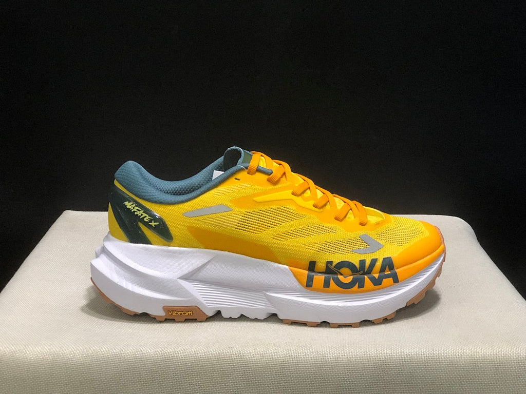 Yellow HOKA Mafate X Trail Running Shoes - product image from the listing.