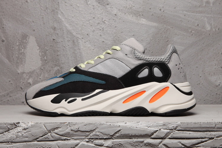 Men's Adidas 700 Sneakers in Gray, Black and Orange - product image from the listing.