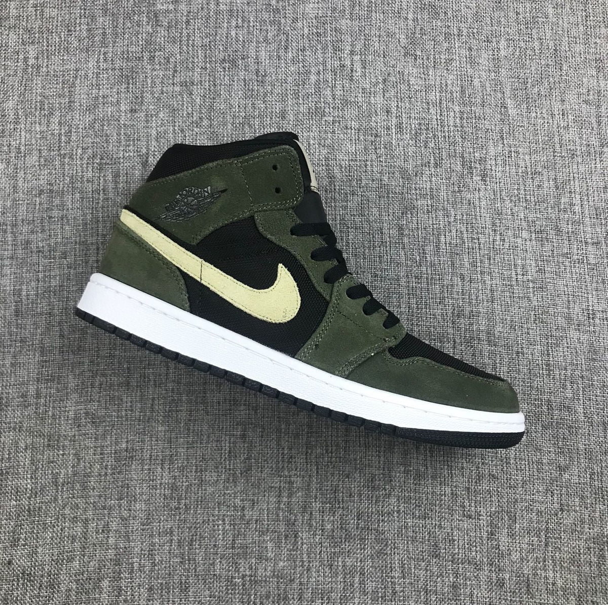 Air Jordan 1 Mid Sneakers in Olive Green BQ6472-030 - product image from the listing.